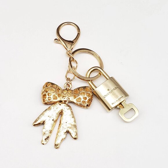 Authentic Louis Vuitton Lock & Key with unbranded Ribbon Bagcharm, Keycharm - Picture 4 of 7